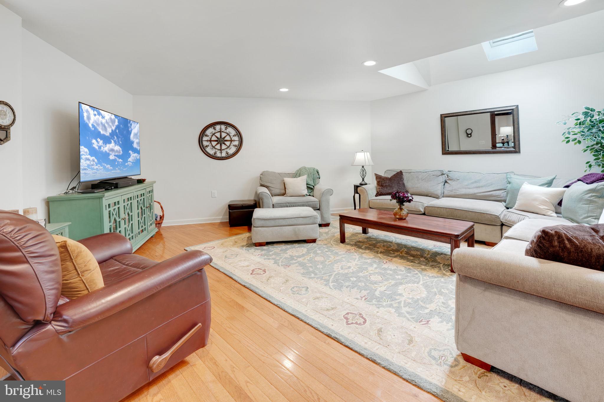 4208 High Ridge Road Haymarket, VA 20169 - Photo 13 of 62 Spacious Family Room with Sunlit Skylight.