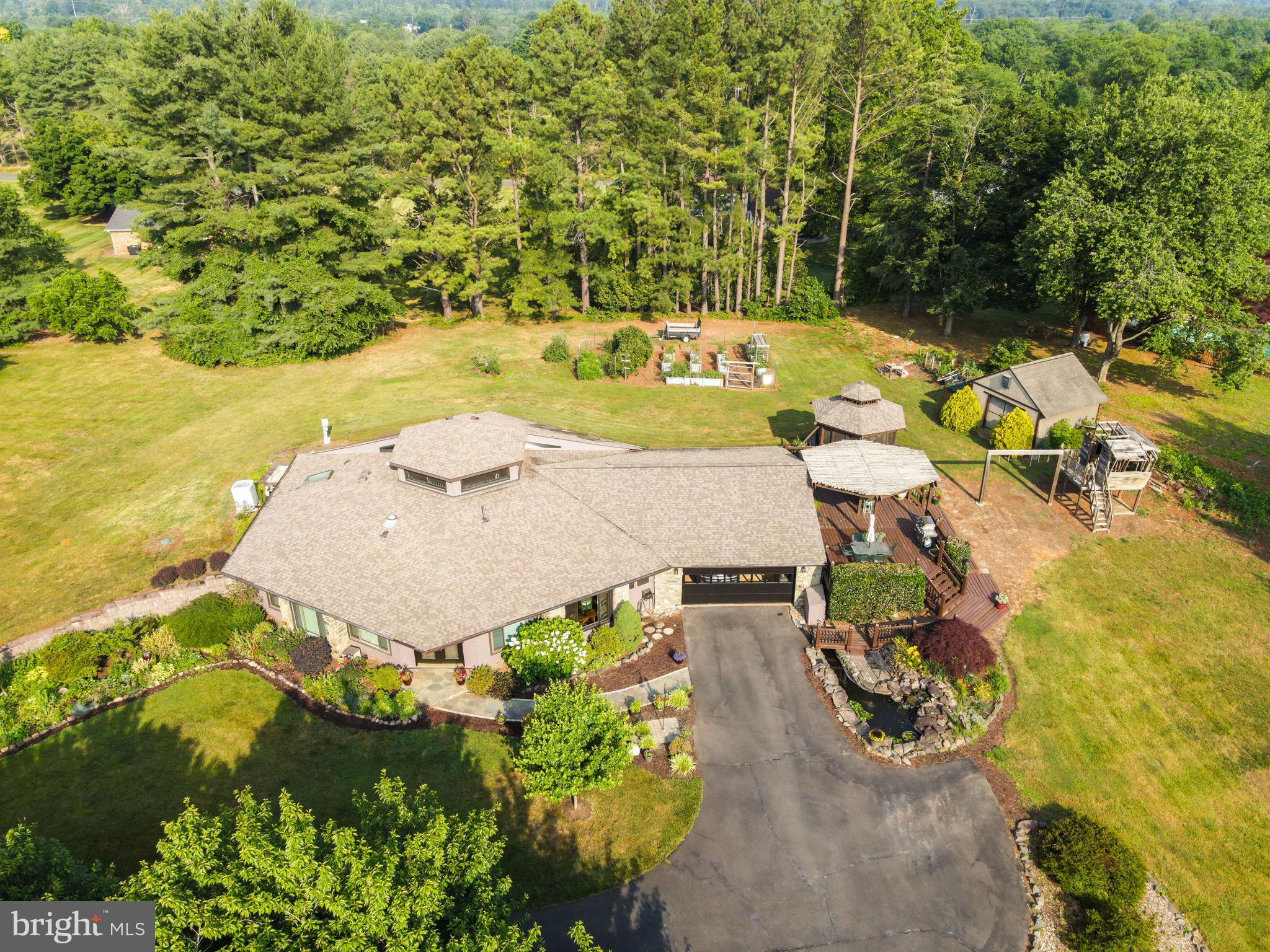 Nestled on 3.06-acre Lot with Serene Views!