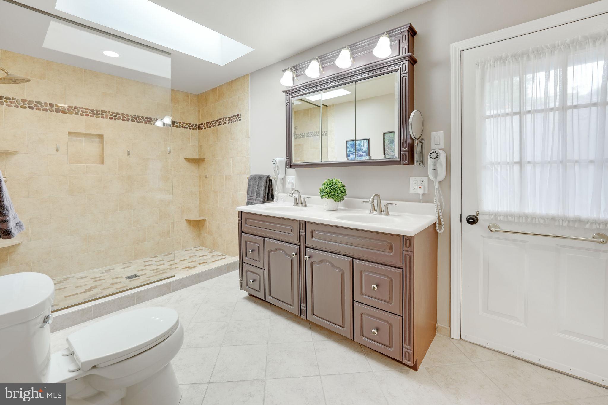 4208 High Ridge Road Haymarket, VA 20169 - Photo 27 of 62 Owner's Bath with Newer Tile Floors & Dbl Vanity.