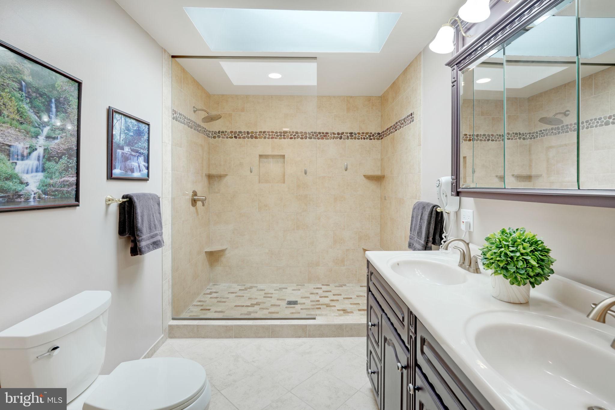 4208 High Ridge Road Haymarket, VA 20169 - Photo 28 of 62 Updated Owner's Bath with Large Walk-In Shower.