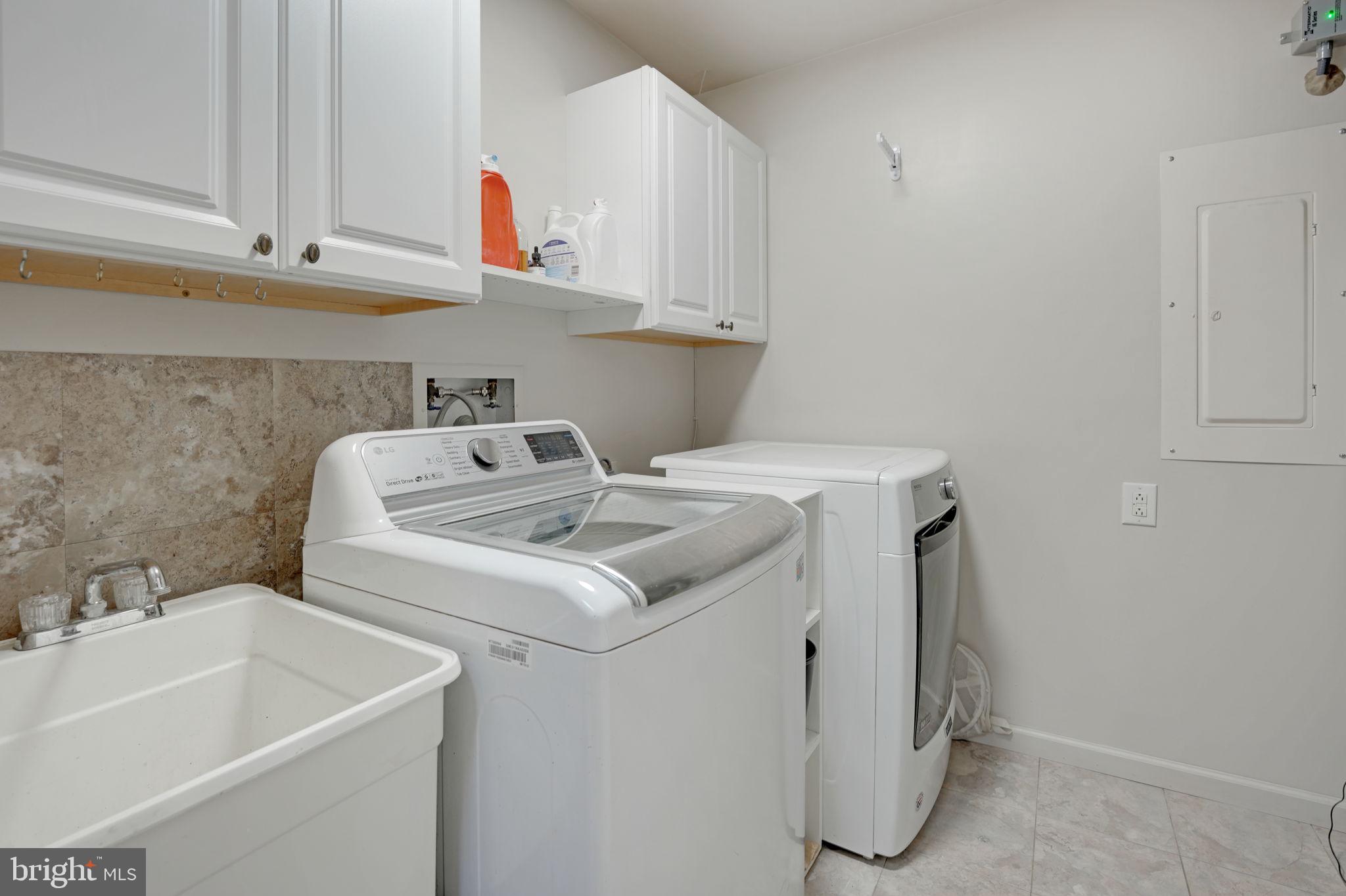 4208 High Ridge Road Haymarket, VA 20169 - Photo 45 of 62 Laundry Room with Ample Storage & Utility Sink.