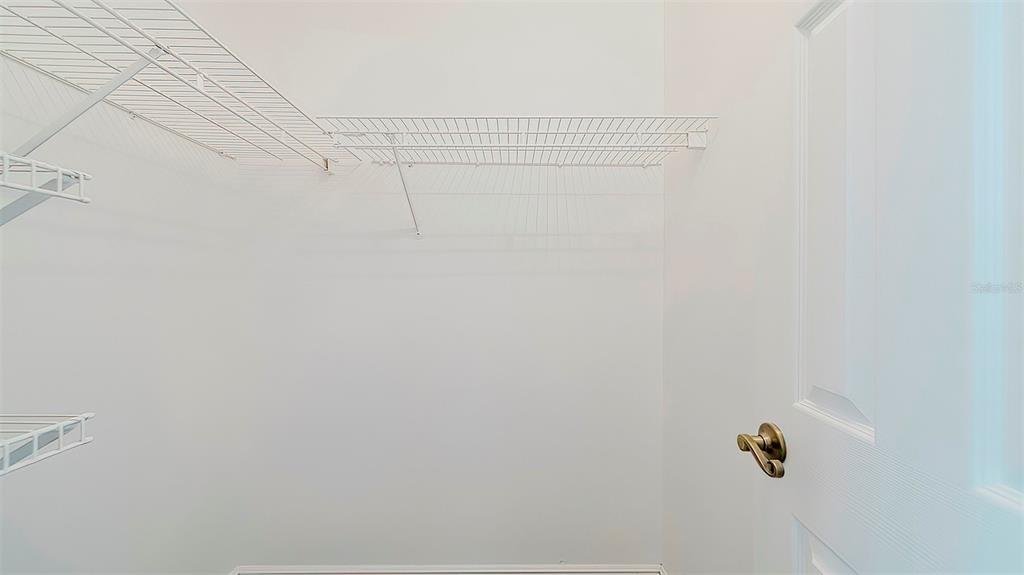 4225 La Pasida Lane New Port Richey, FL 34655 - Photo 32 of 55 a view of small space with racks on the wall