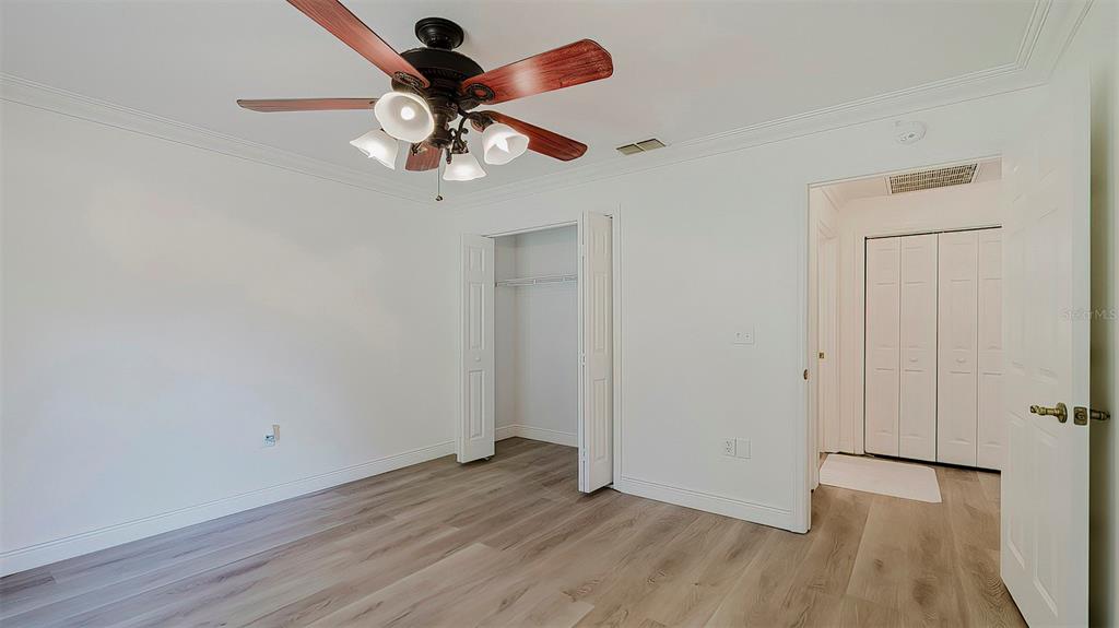 4225 La Pasida Lane New Port Richey, FL 34655 - Photo 40 of 55 a view of room with hardwood floor and ceiling fan