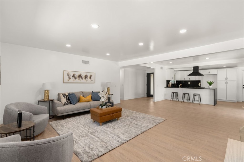 5417 Peacock Lane Riverside, CA 92505 - Photo 17 of 44 a living room with furniture and a rug