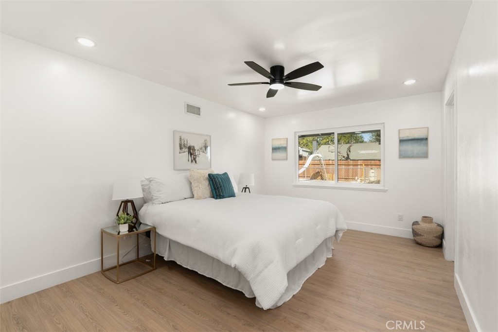 5417 Peacock Lane Riverside, CA 92505 - Photo 26 of 44 a bedroom with a bed and a window