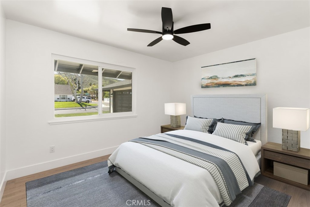 5417 Peacock Lane Riverside, CA 92505 - Photo 32 of 44 a bedroom with a bed and a window