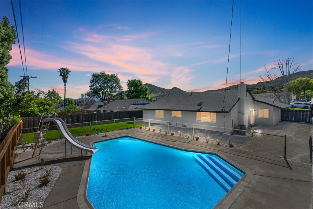 5417 Peacock Lane Riverside, CA 92505 - Photo 4 of 44 a view of a house with pool
