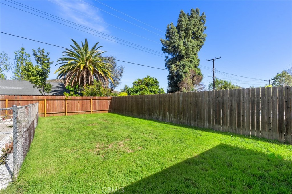 5417 Peacock Lane Riverside, CA 92505 - Photo 42 of 44 a view of a yard with a house