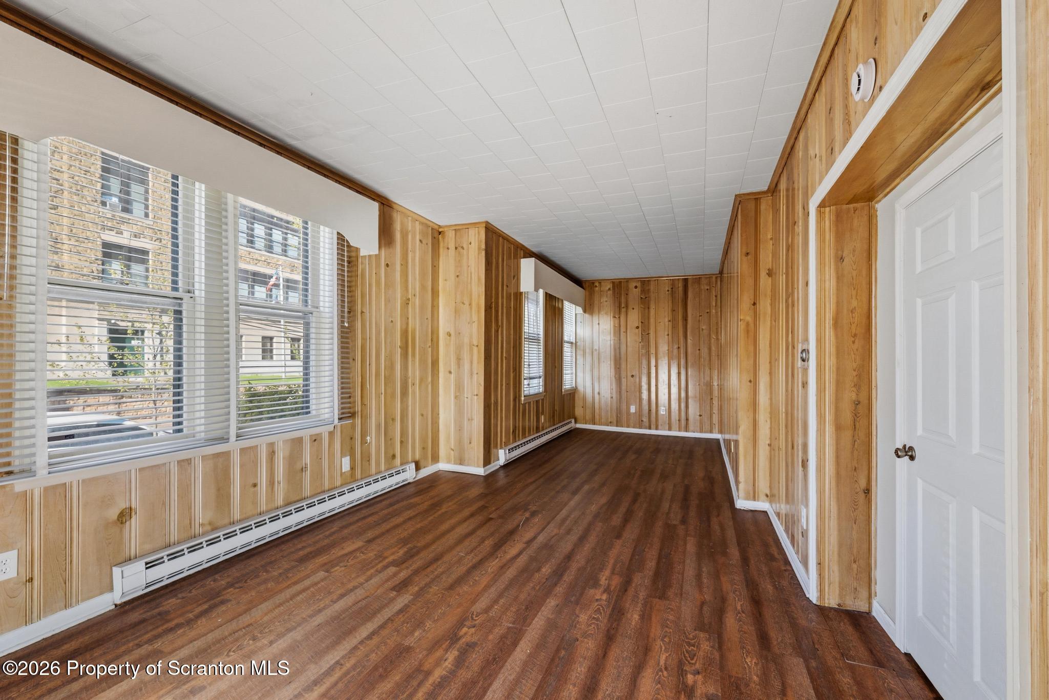801 Adams Avenue Scranton, PA 18510 - Photo 16 of 34 a view of an entryway with wooden floor and door