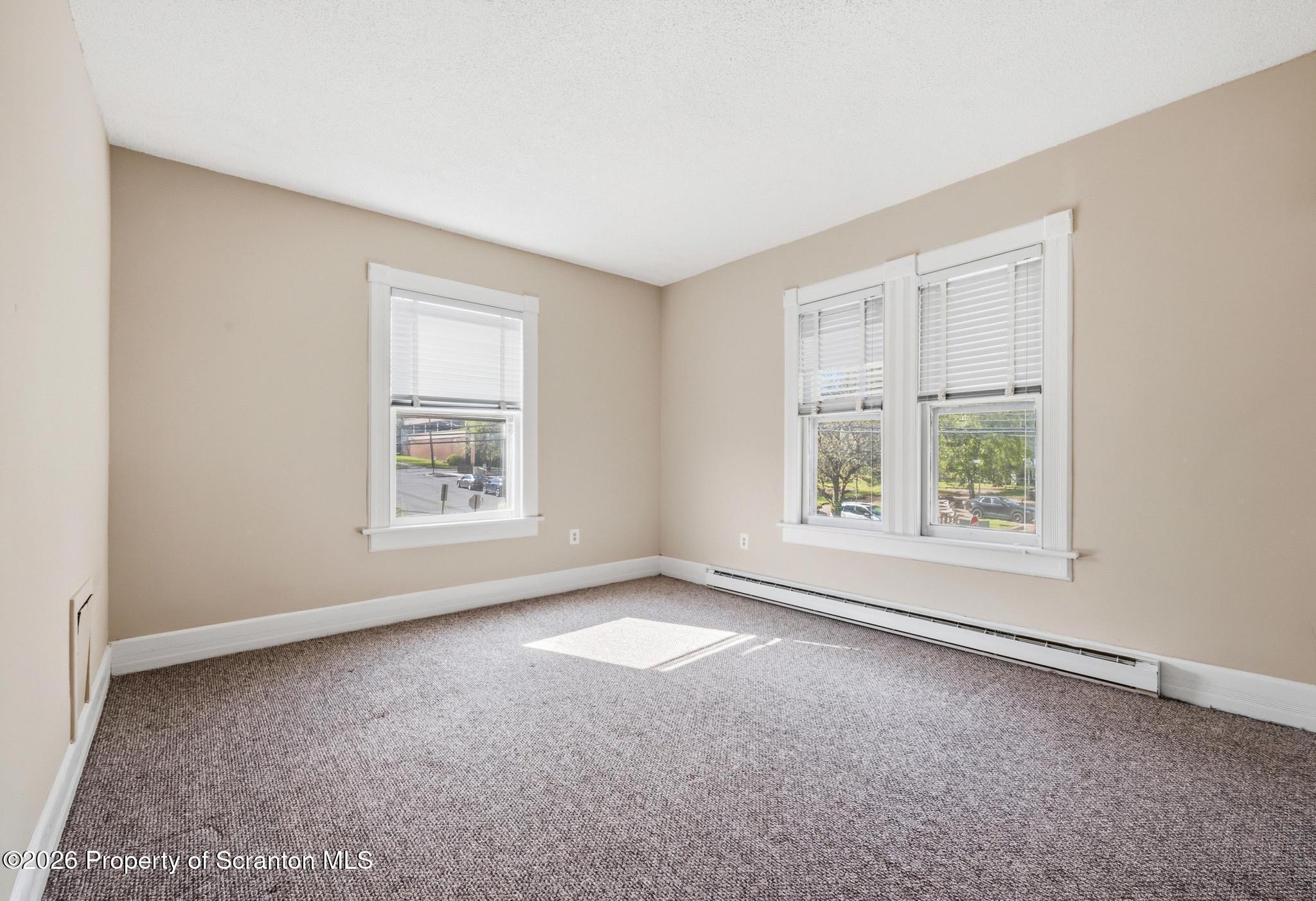 801 Adams Avenue Scranton, PA 18510 - Photo 23 of 34 an empty room with windows