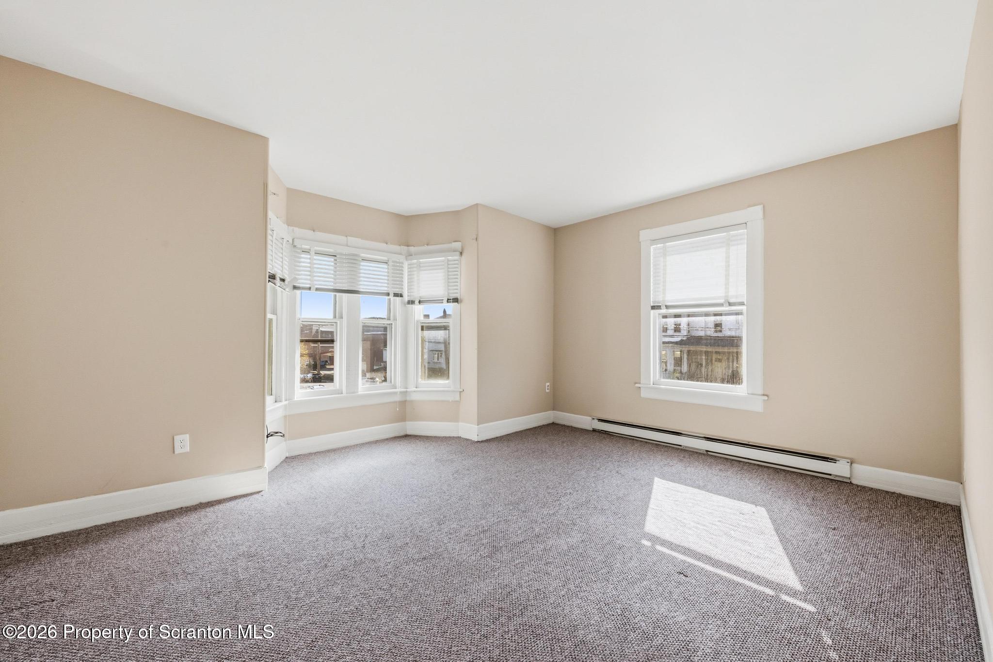 801 Adams Avenue Scranton, PA 18510 - Photo 25 of 34 an empty room with windows
