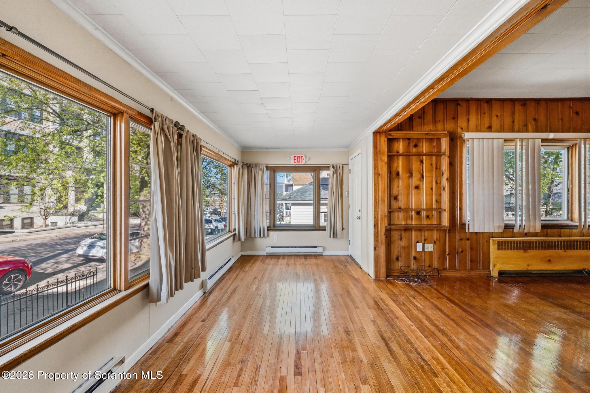 801 Adams Avenue Scranton, PA 18510 - Photo 10 of 34 a view of a house with wooden floor