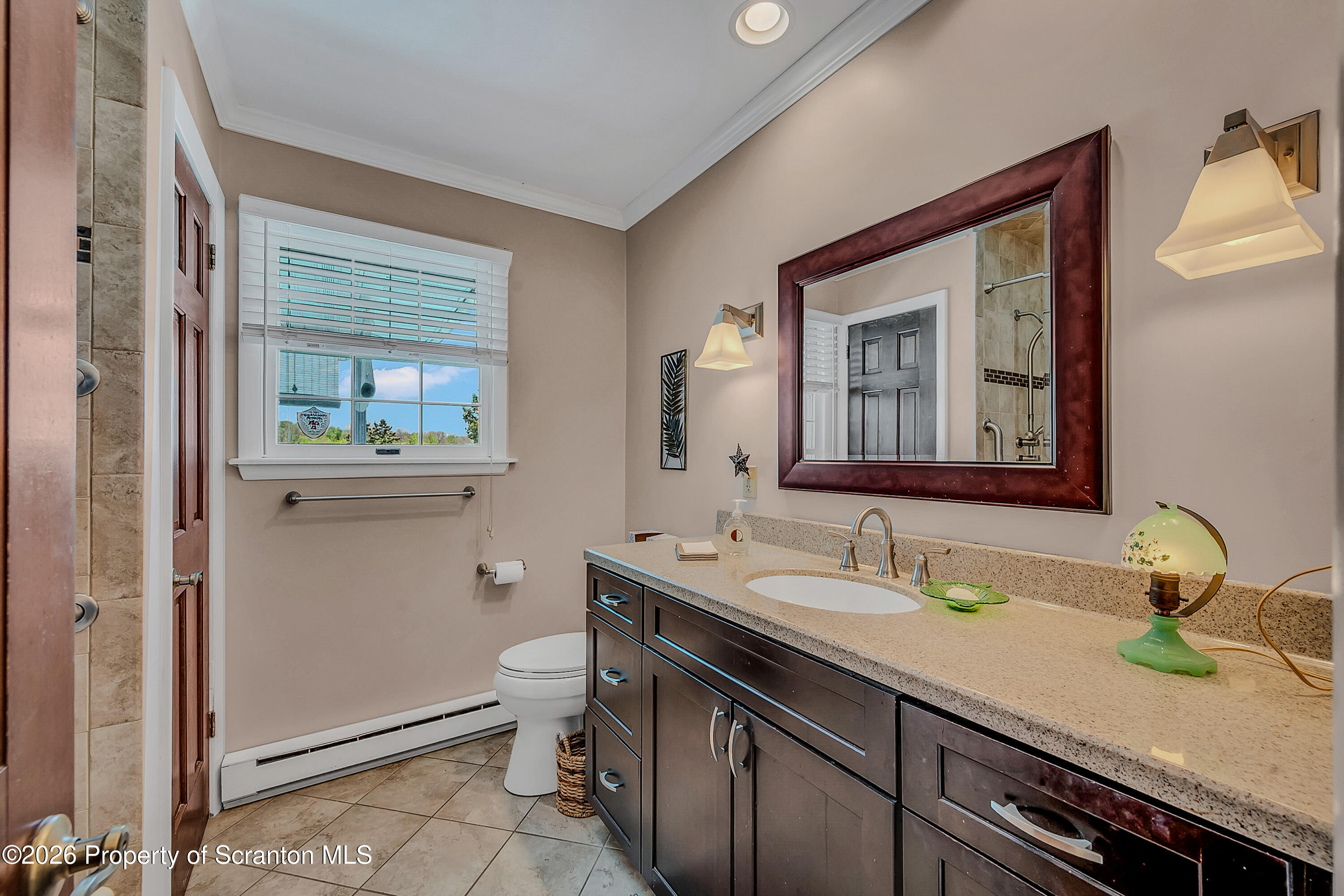 1832 West Gibson Street Scranton, PA 18504 - Photo 12 of 54 a bathroom with a sink double vanity and a toilet