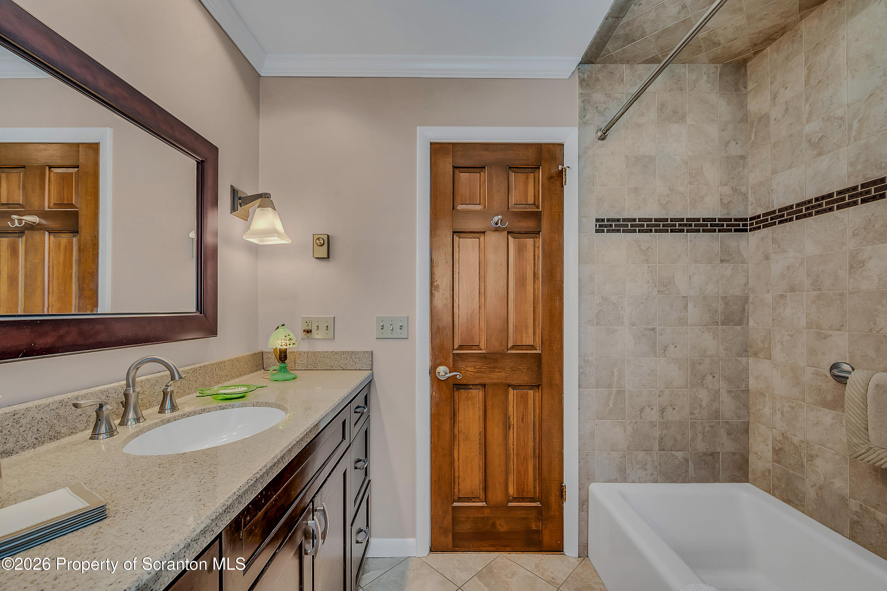 1832 West Gibson Street Scranton, PA 18504 - Photo 14 of 54 a bathroom with a granite countertop sink a mirror and shower