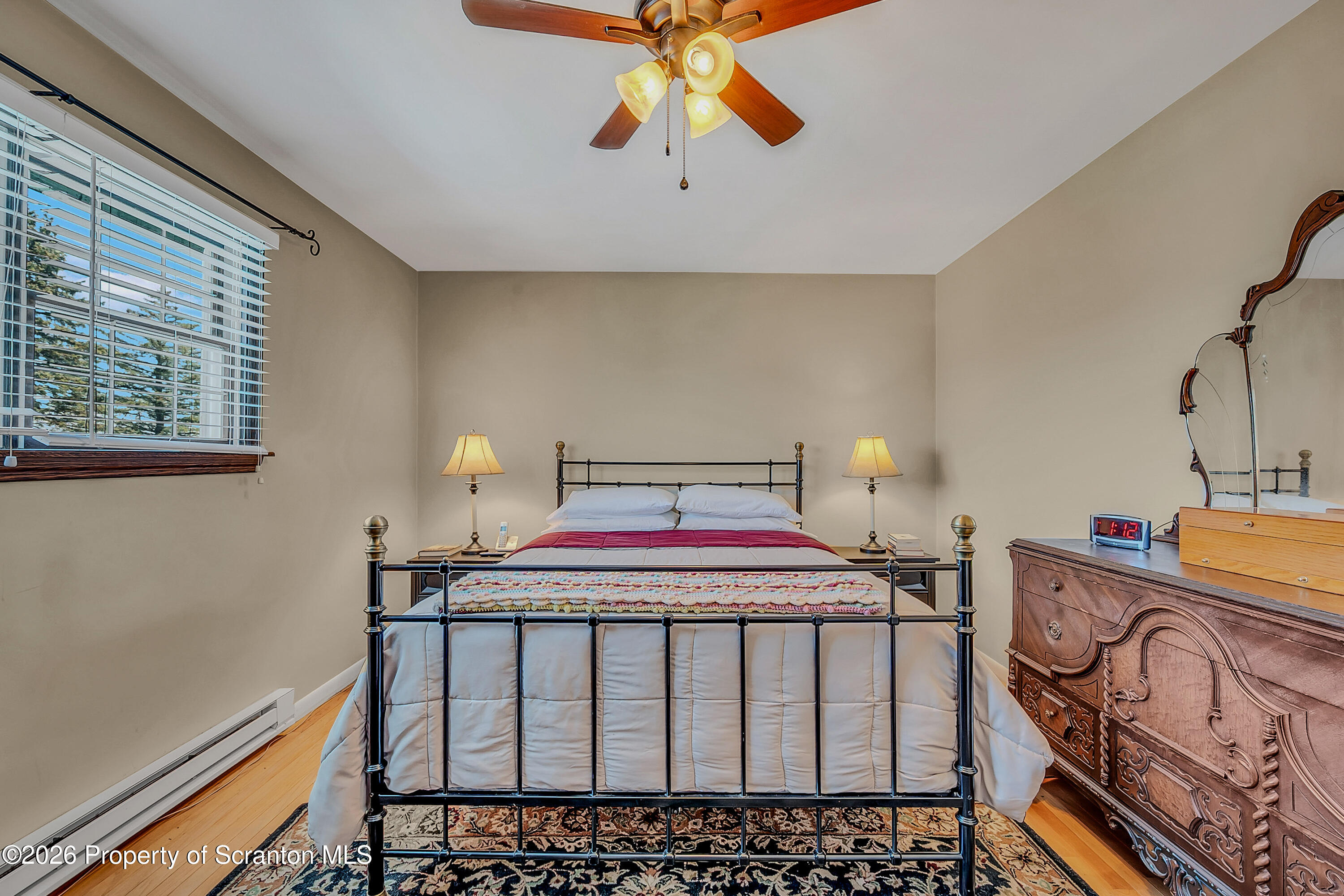 1832 West Gibson Street Scranton, PA 18504 - Photo 20 of 54 a bedroom with a bed and a chandelier