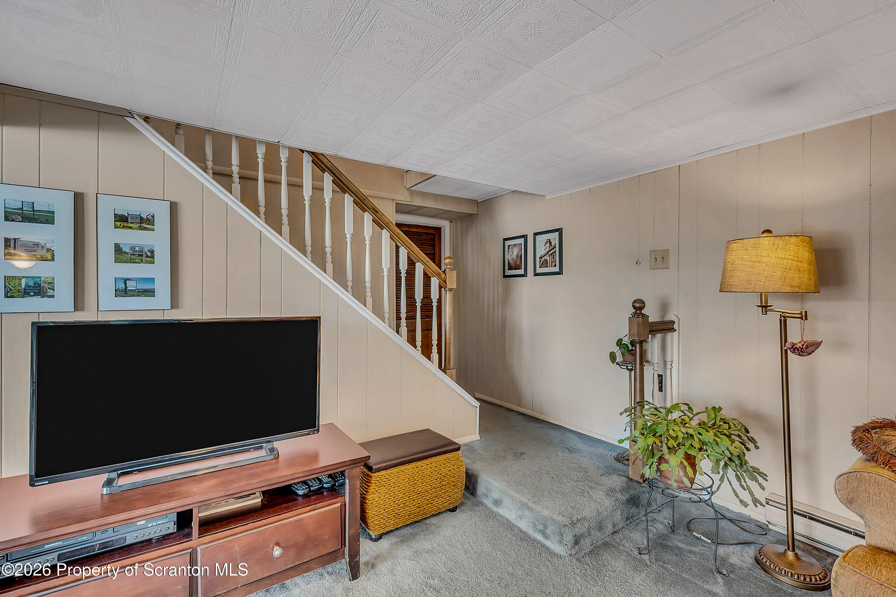 1832 West Gibson Street Scranton, PA 18504 - Photo 29 of 54 a living room with furniture and a flat screen tv