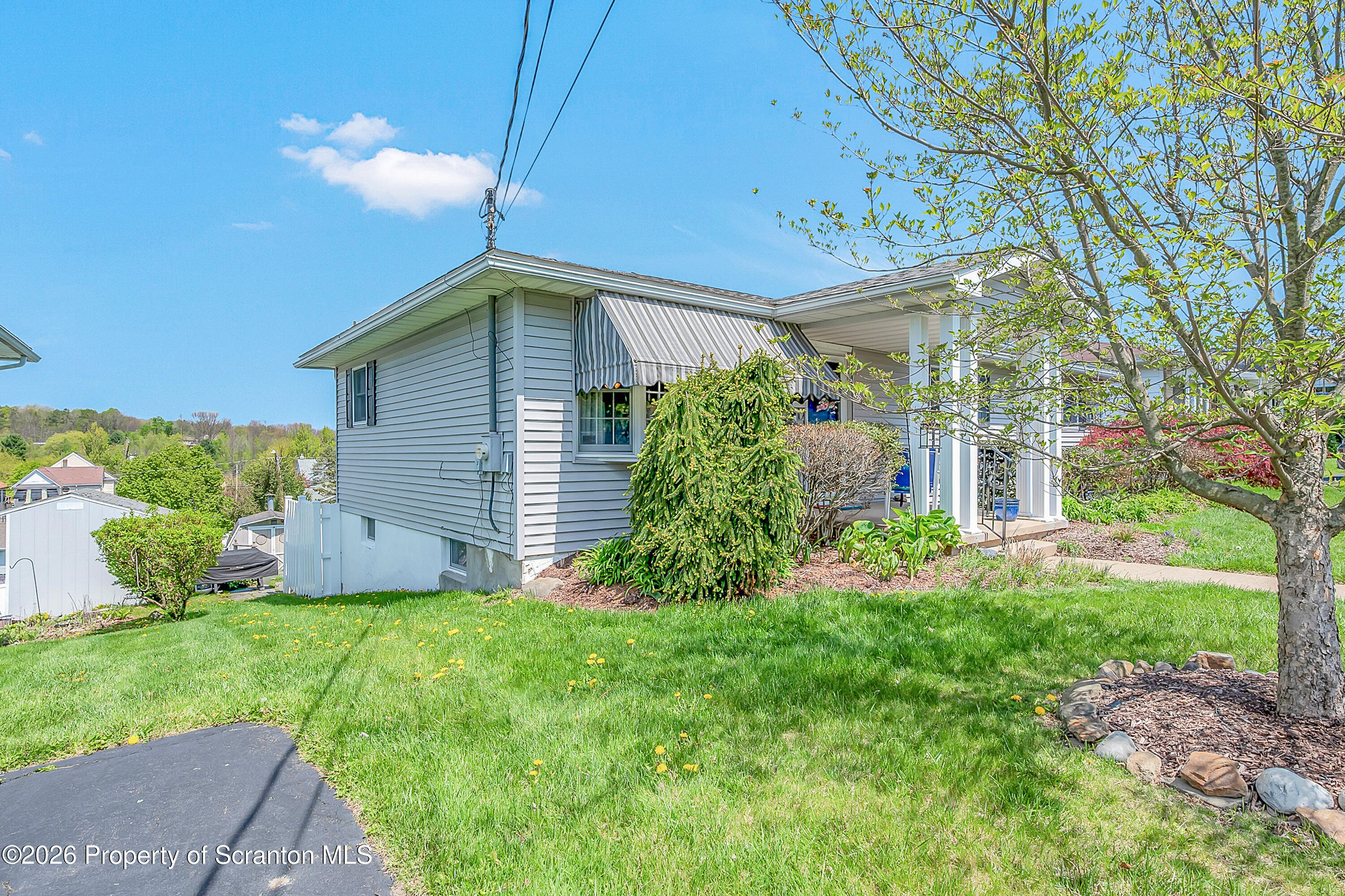 1832 West Gibson Street Scranton, PA 18504 - Photo 3 of 54 a front view of a house with a yard