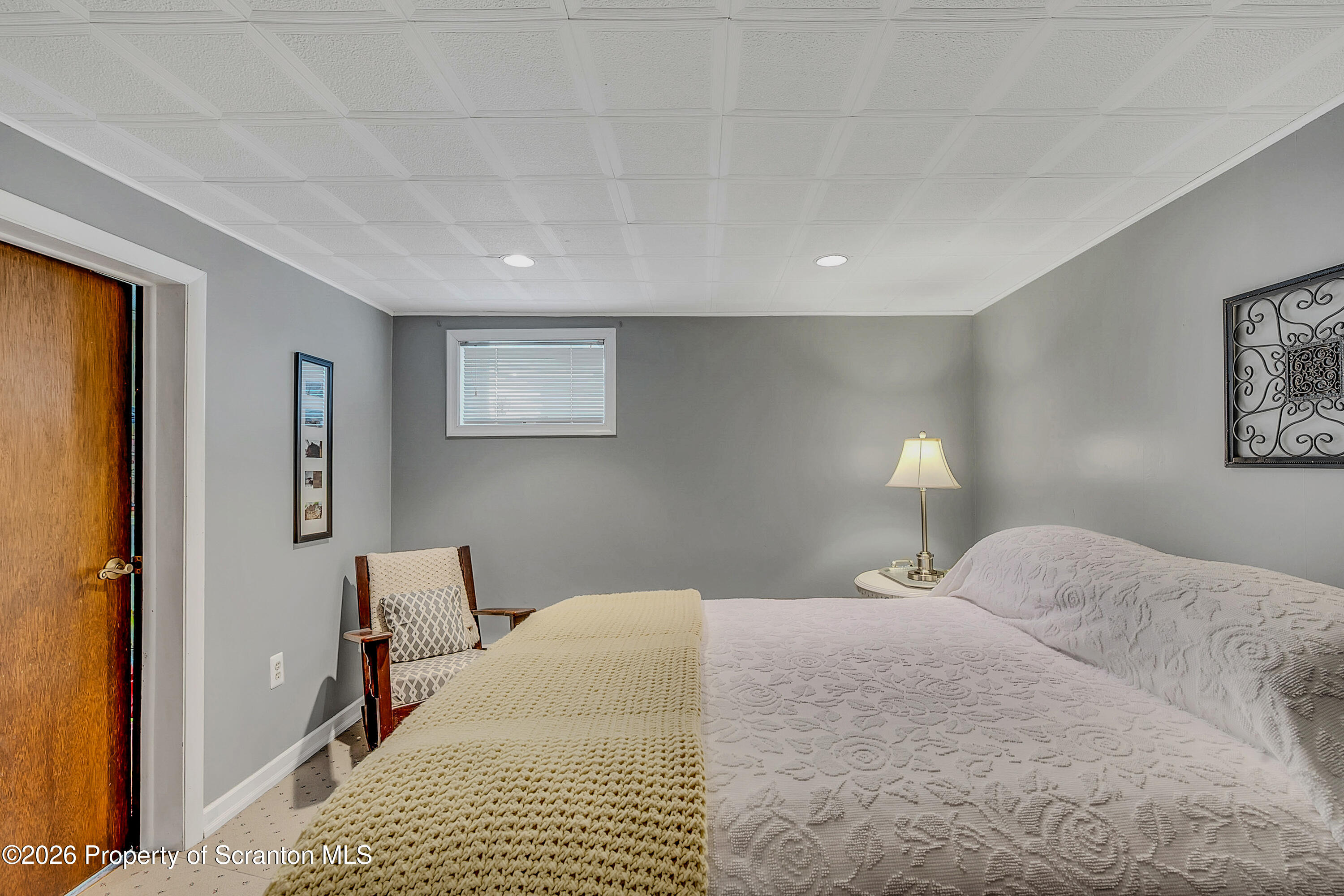 1832 West Gibson Street Scranton, PA 18504 - Photo 31 of 54 a bedroom with a bed and a lamp