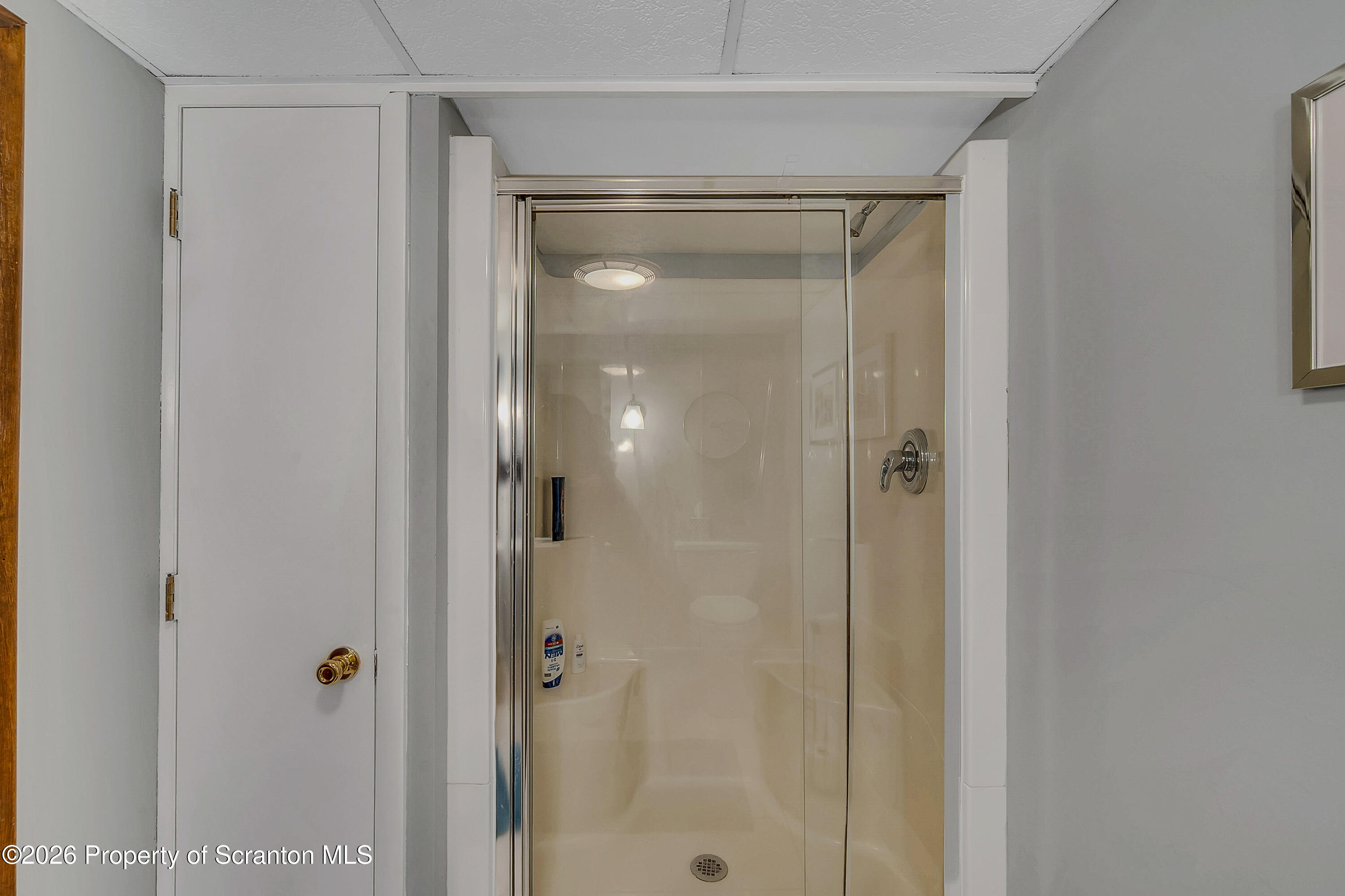 1832 West Gibson Street Scranton, PA 18504 - Photo 33 of 54 a bathroom with a glass shower door