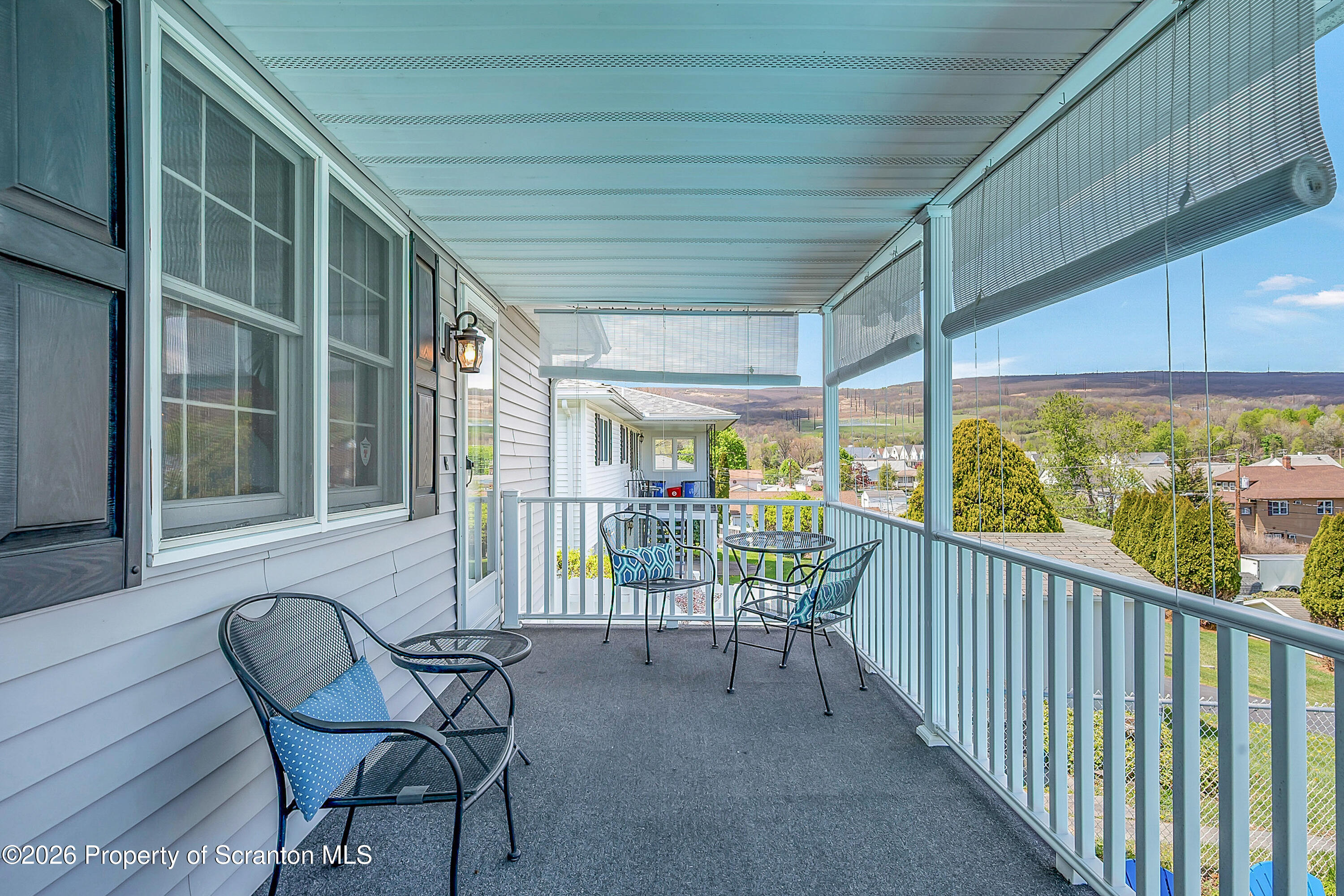 1832 West Gibson Street Scranton, PA 18504 - Photo 34 of 54 a view of a porch with furniture and floor to ceiling window