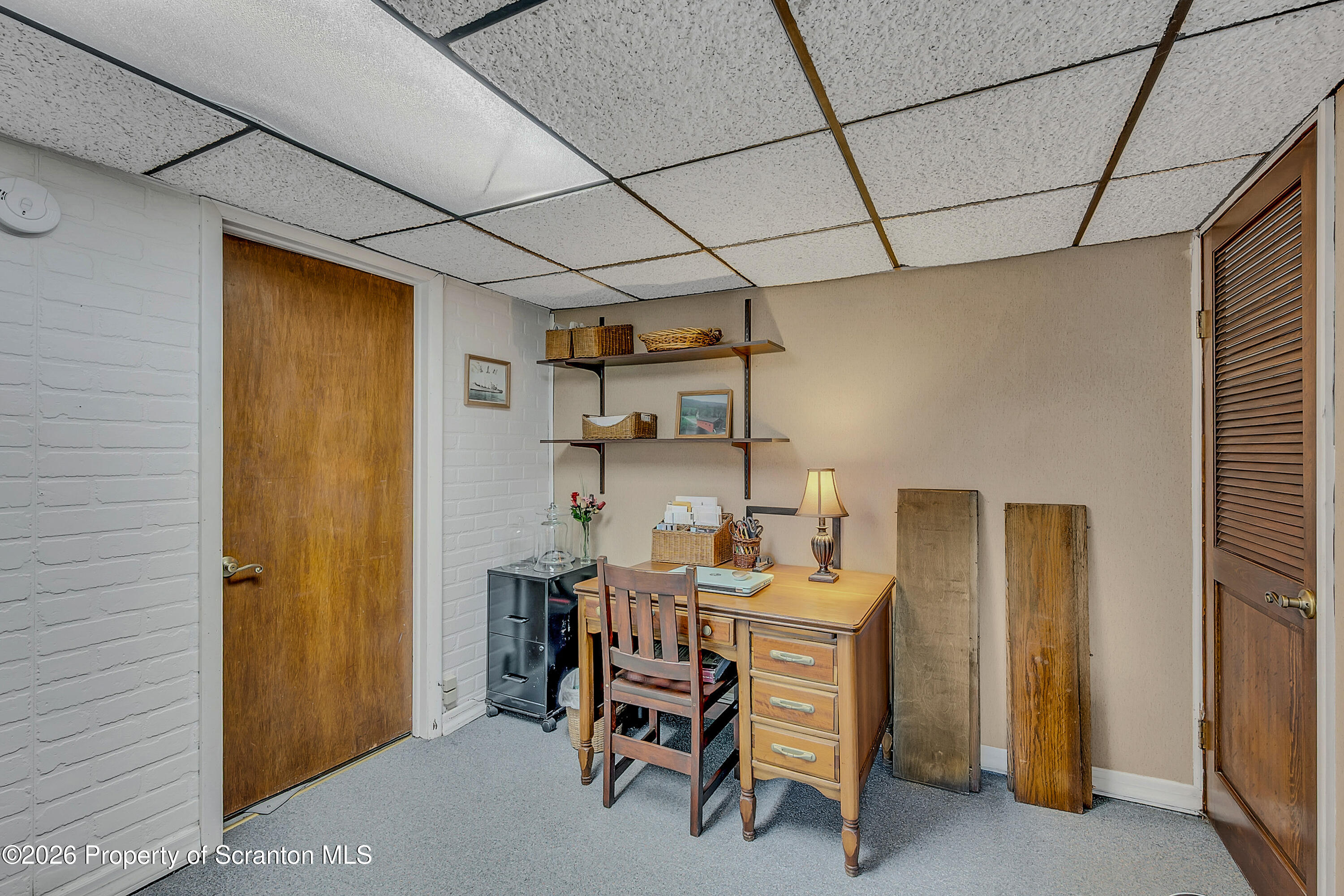 1832 West Gibson Street Scranton, PA 18504 - Photo 48 of 54 a room with furniture and a window