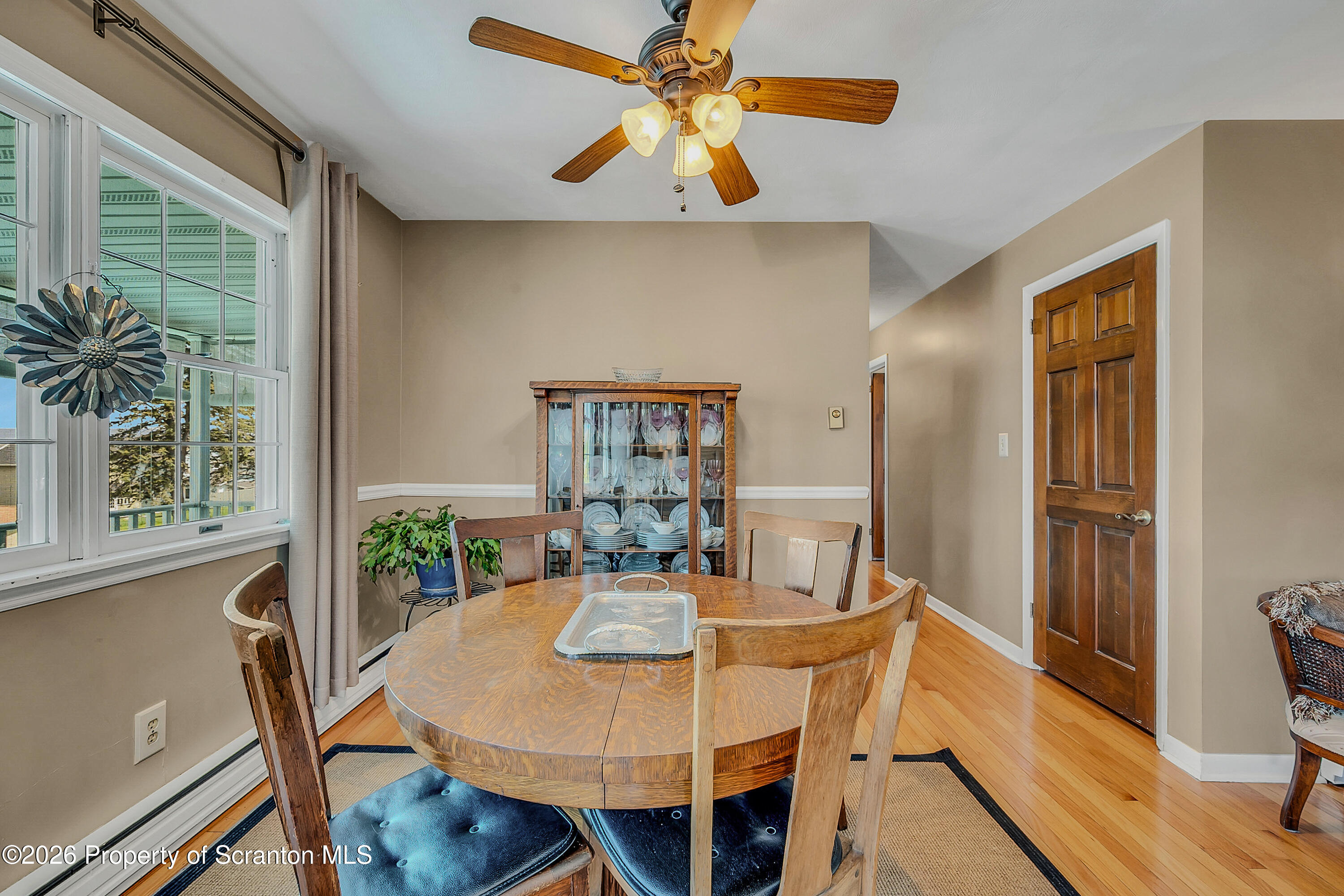 1832 West Gibson Street Scranton, PA 18504 - Photo 8 of 54 a view of a dining room with furniture window and wooden floor