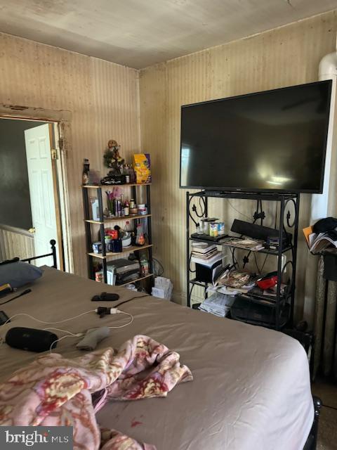 518 South 55th Street Philadelphia, PA 19143 - Photo 11 of 49 a bed room with a bed and a flat screen tv