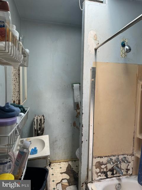 518 South 55th Street Philadelphia, PA 19143 - Photo 13 of 49 a bathroom with a sink and a mirror