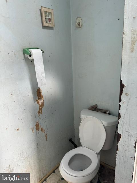 518 South 55th Street Philadelphia, PA 19143 - Photo 18 of 49 a white toilet sitting next to a bathroom sink and a mirror