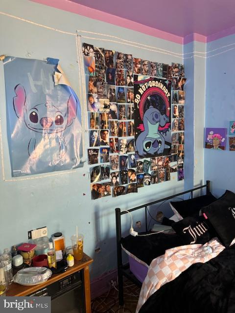 518 South 55th Street Philadelphia, PA 19143 - Photo 19 of 49 a room with furniture and wall paintings