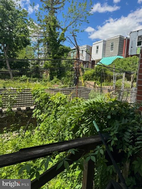 518 South 55th Street Philadelphia, PA 19143 - Photo 2 of 49 a view of a brick house with a flower garden