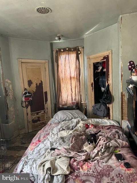 518 South 55th Street Philadelphia, PA 19143 - Photo 27 of 49 a bedroom with a bed and a dresser