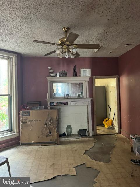 518 South 55th Street Philadelphia, PA 19143 - Photo 38 of 49 a living room with fireplace furniture and a window