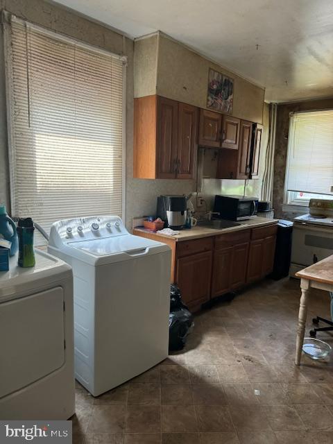 518 South 55th Street Philadelphia, PA 19143 - Photo 40 of 49 a kitchen with a sink cabinets and window