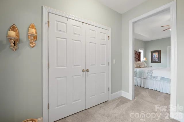 wooden floor with white walls