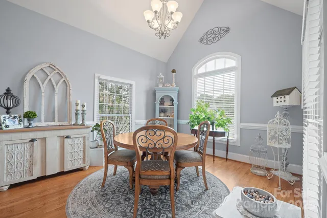 a utility room with sink dryer and washer