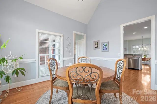 a utility room with sink dryer and washer