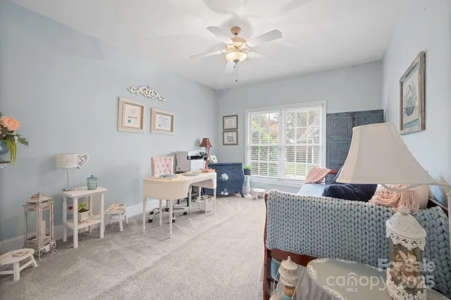 a bathroom with a granite countertop sink toilet and a bathtub