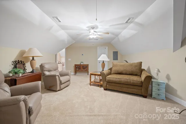 a view of a patio with a table and chairs
