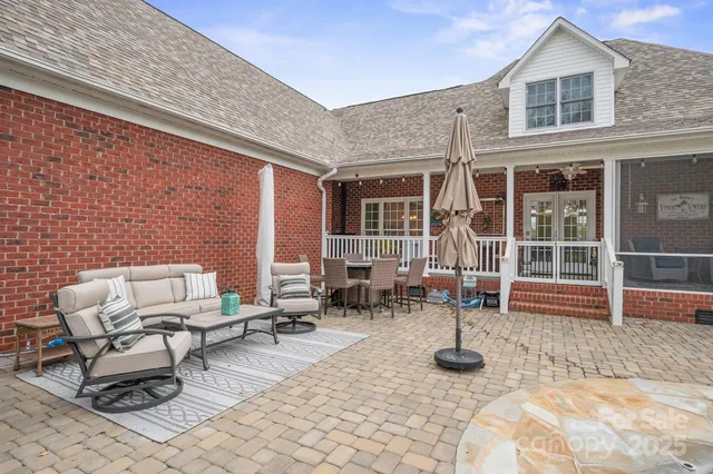 a view of pool with mountain and trees