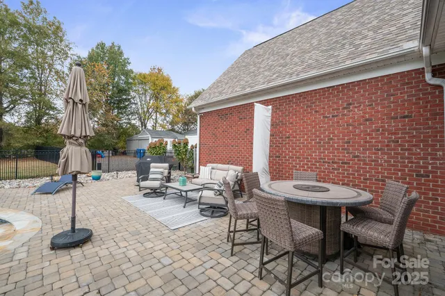 a view of a swimming pool with a yard