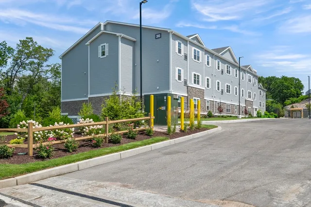 a front view of a building with street view