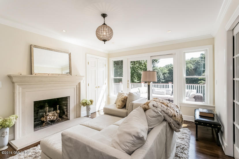 102 Hunting Ridge Road Greenwich, CT 06831 - Photo 13 of 29 a living room with furniture and a fireplace