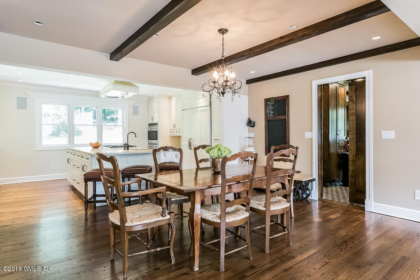 102 Hunting Ridge Road Greenwich, CT 06831 - Photo 8 of 29 a view of a dining room with furniture and wooden floor