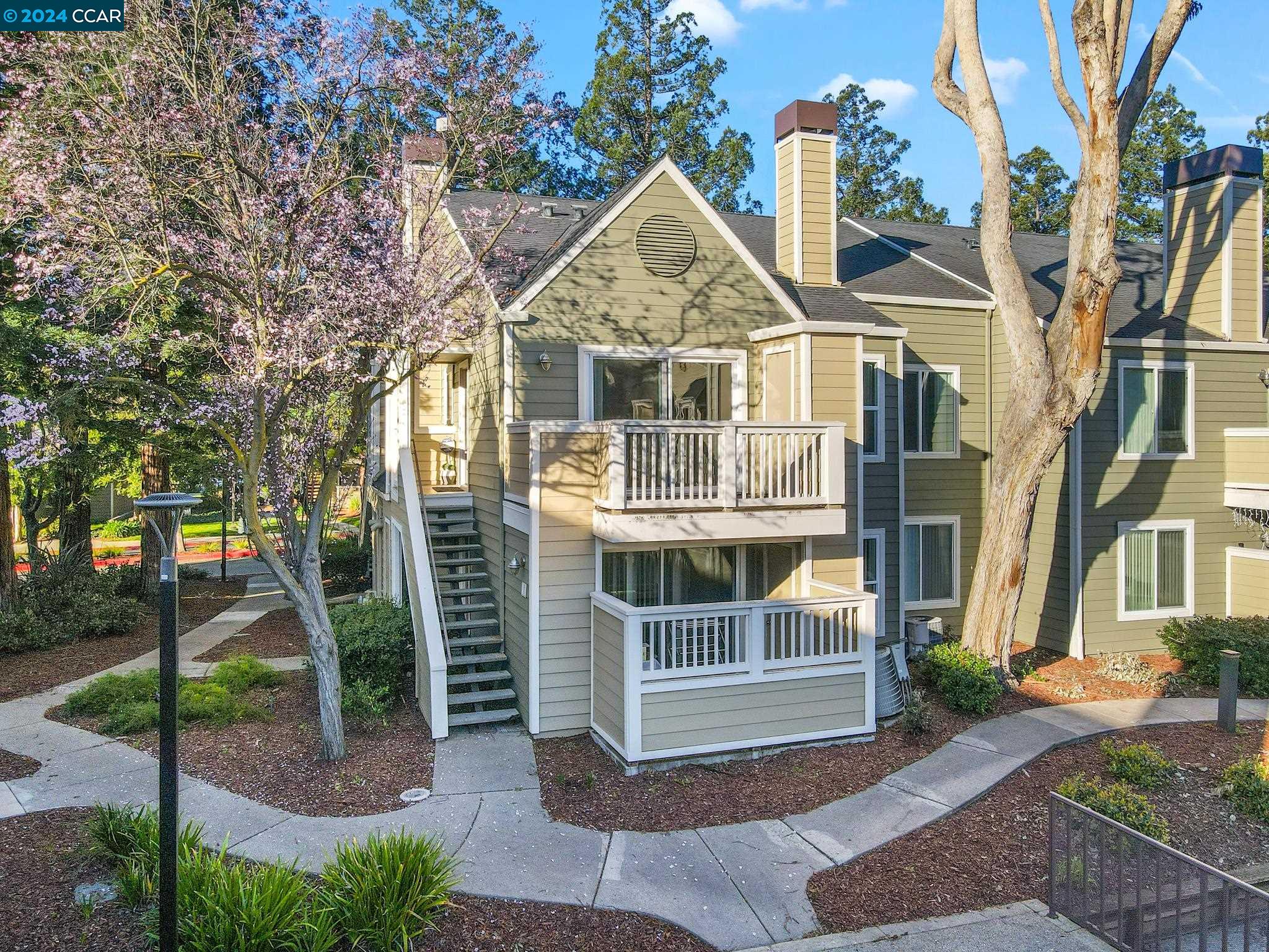 285 Reflections Drive, Unit 25 San Ramon, CA 94583 - Photo 26 of 42 a view of a house with a yard