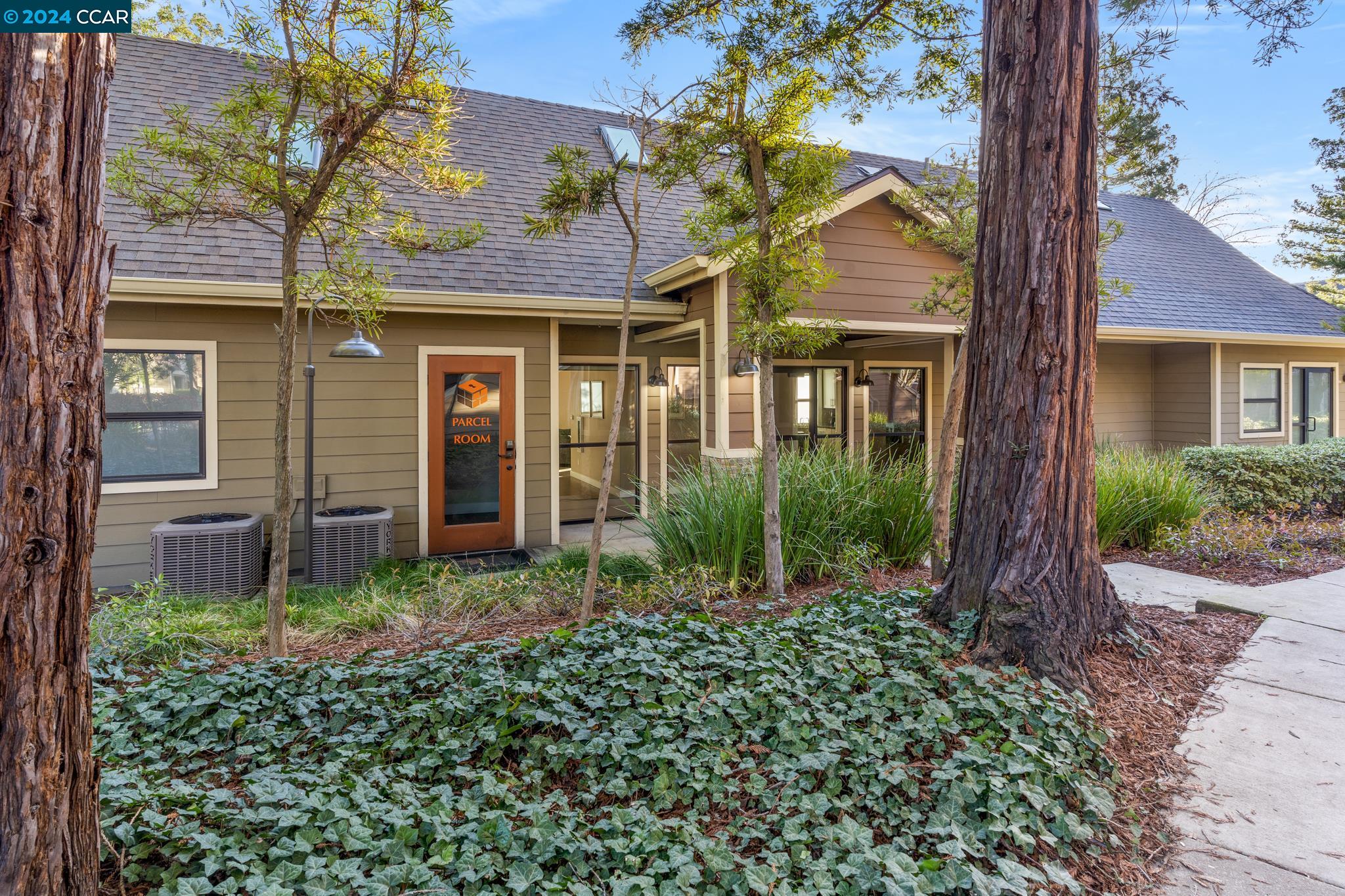 285 Reflections Drive, Unit 25 San Ramon, CA 94583 - Photo 41 of 42 front view of a house with a small yard