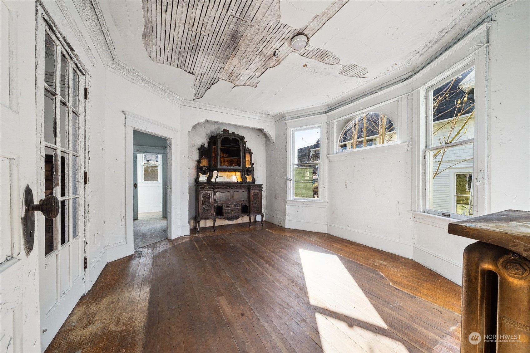 3840 Linden Avenue North Seattle, WA 98103 - Photo 11 of 40 a view of empty room with wooden floor