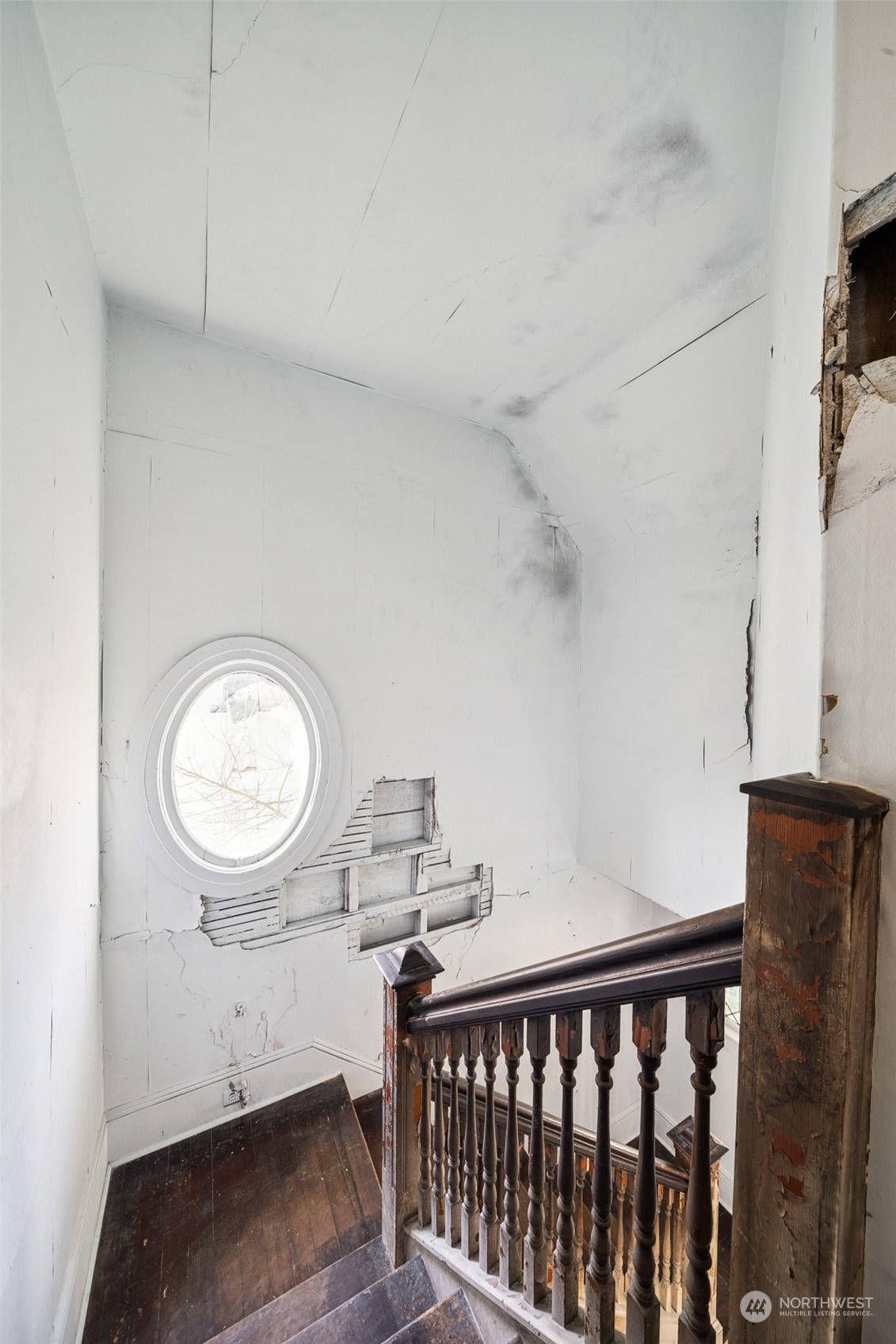 3840 Linden Avenue North Seattle, WA 98103 - Photo 16 of 40 a view of a hallway with washer and dryer