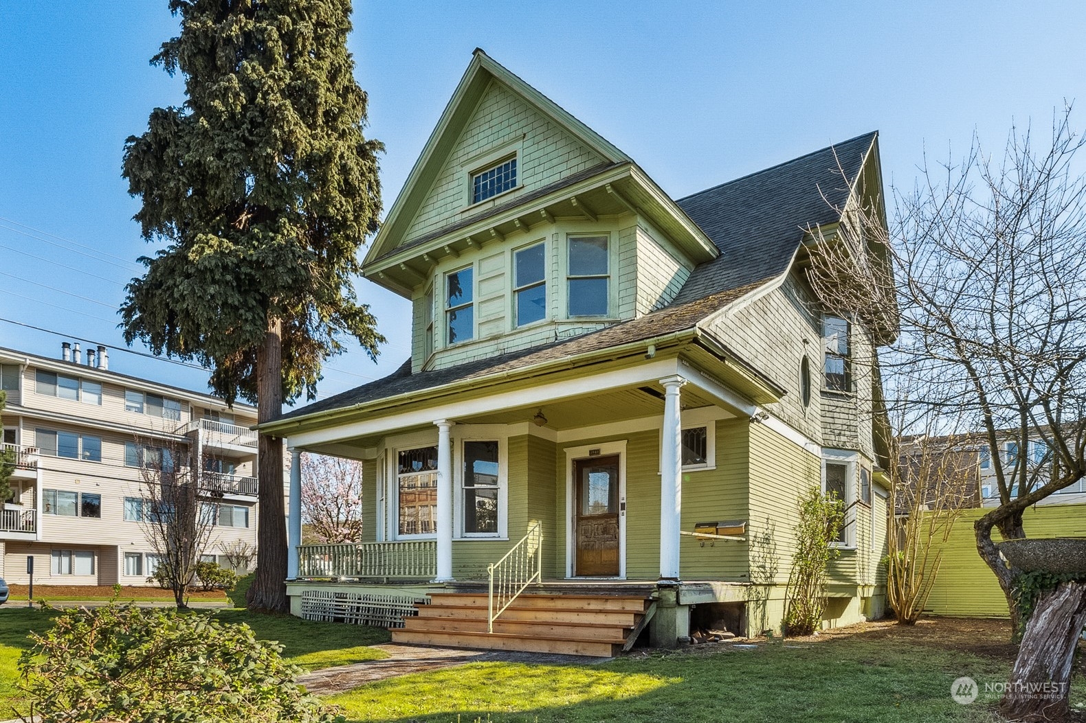 3840 Linden Avenue North Seattle, WA 98103 - Photo 2 of 40 a front view of a house with a yard