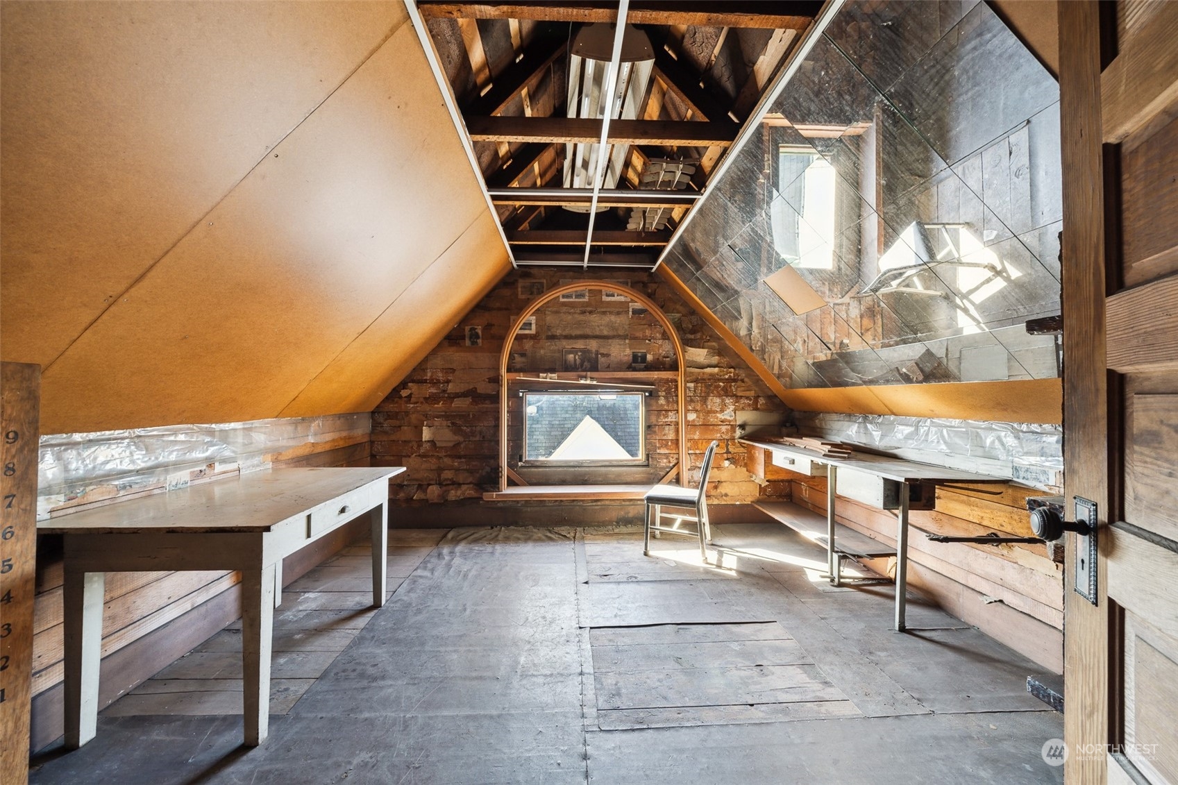 3840 Linden Avenue North Seattle, WA 98103 - Photo 21 of 40 a view of a fireplace with wooden floor
